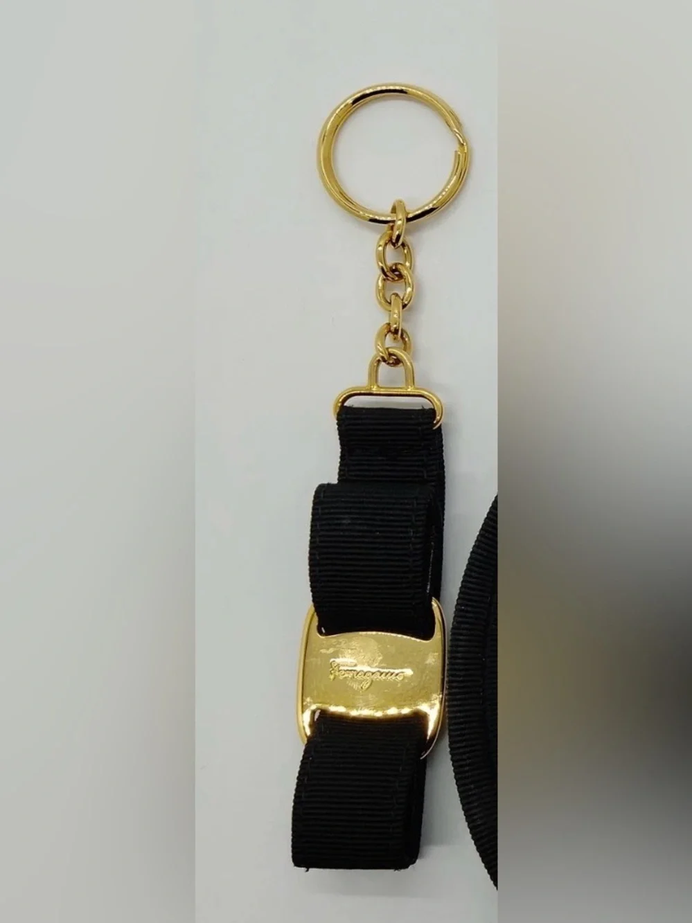 Salvatore Ferragamo Gold Buckle Black Ribbon Keychain box included